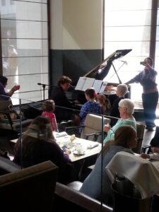 Sew, a needle pulling thread...