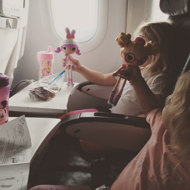 Happy children seated together.